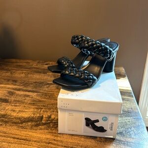 New in box, a new day black heels size 7.5